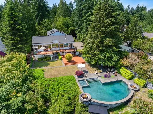 Beautiful home with pool sitting on the front of view
