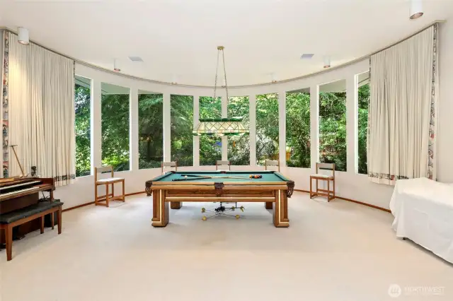 Grand room with rounded windows