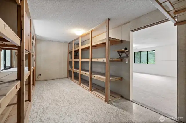 Upstairs flex space - a craft room with plenty of storage space.