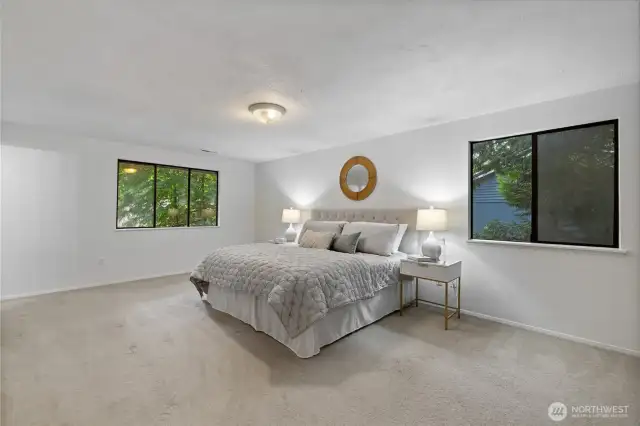 Huge primary bedroom stretches across the whole top floor.