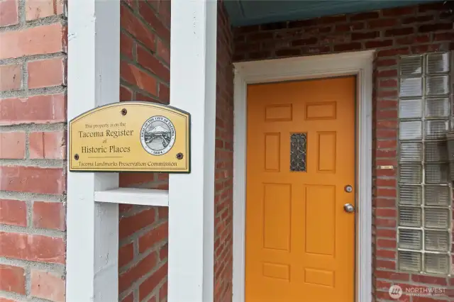 A freshly painted front door for a pop of color and vintage glass bricks
