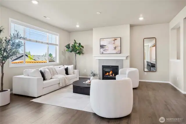 Cozy fireplace, in spacious living room!