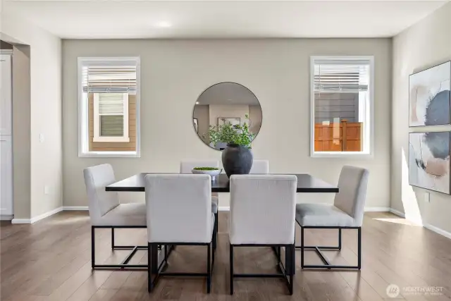 Open concept dining room, with plenty of space for large dining table and sideboard/buffet
