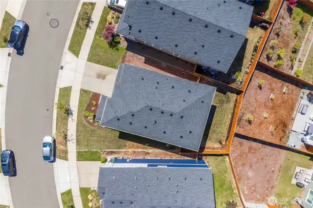 Flat yard, with plenty of privacy from backdoor neighbor, who's house sits lower. It is a blank canvas.