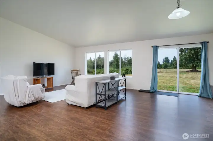Open concept living with wonderful views of pasture to the West.