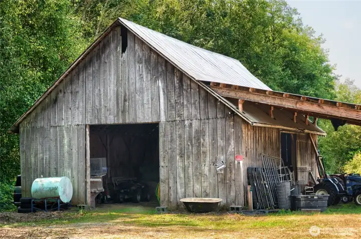 1940's barn with original wood offers functional storage and a ton of charm!