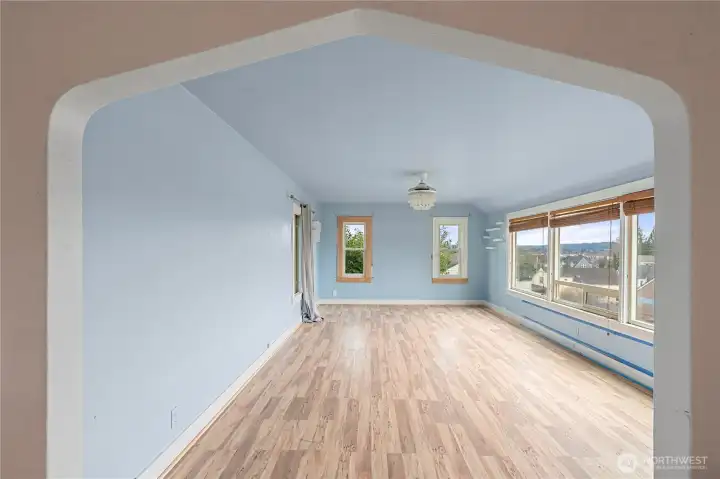 Entrance to spacious living room overlooking the city & river