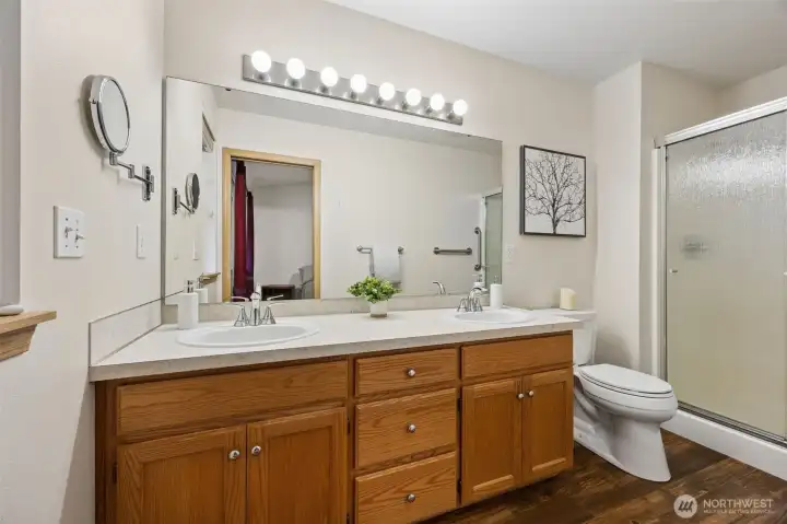 Having a 3/4 bath in the primary bedroom of a rambler is smart design. Great for aging in place!