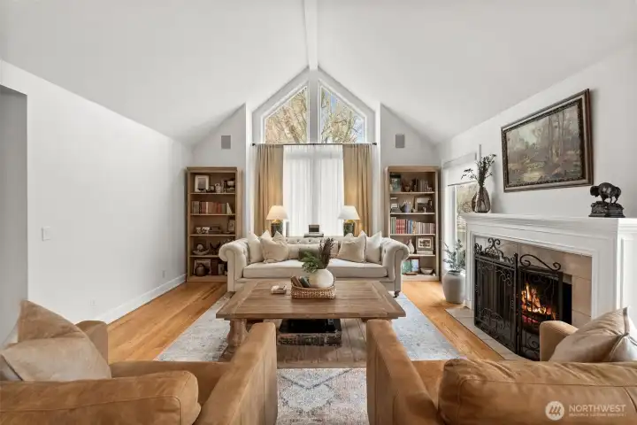 Another angle of the formal living room with a stunning angled window.
