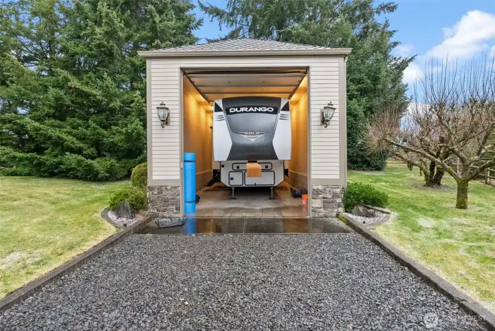 The heated RV garage, currently storing a large 5th wheel.