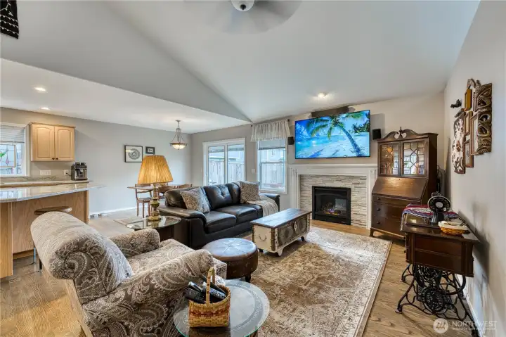 Family room with gas fireplace and large screen
