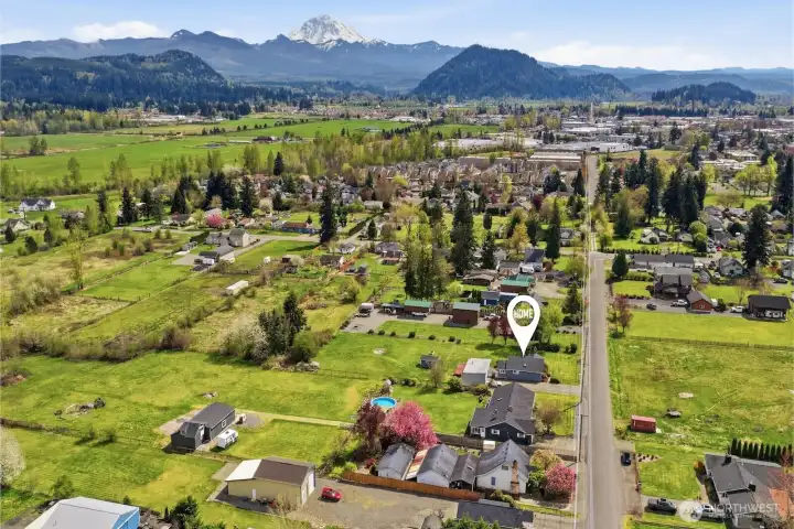 Experience the perfect blend of privacy and convenience on this rare, flat shy-acre lot located just two minutes from downtown.