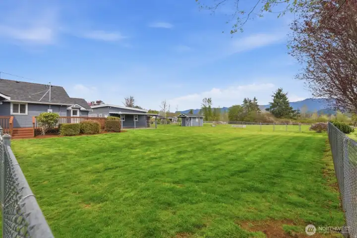 Experience true Pacific Northwest living with sweeping territorial views that stretch toward the foothills, providing a serene backdrop for daily life.