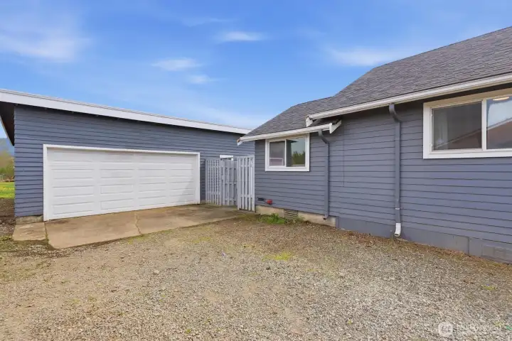 The massive 660 sqft detached garage and shop is a true standout, featuring a newer roof and premium Pella windows.