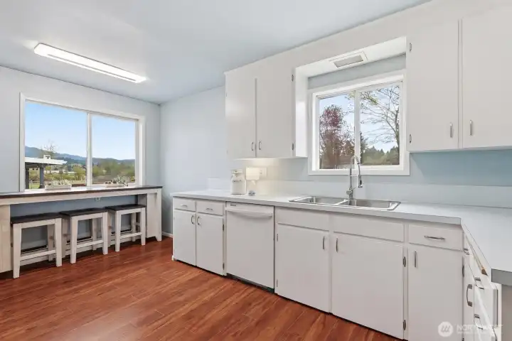 Heart of the Home: This efficient layout offers plenty of counter space for meal prep and opens easily toward the dining area, making it ideal for both busy mornings and evening hosting.
