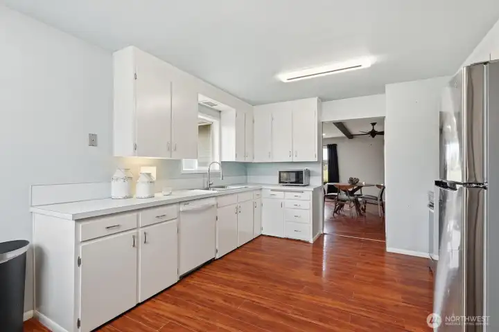 Ample Storage: Featuring a generous amount of cabinetry, this kitchen ensures you have plenty of room for all your culinary essentials and seasonal gear.