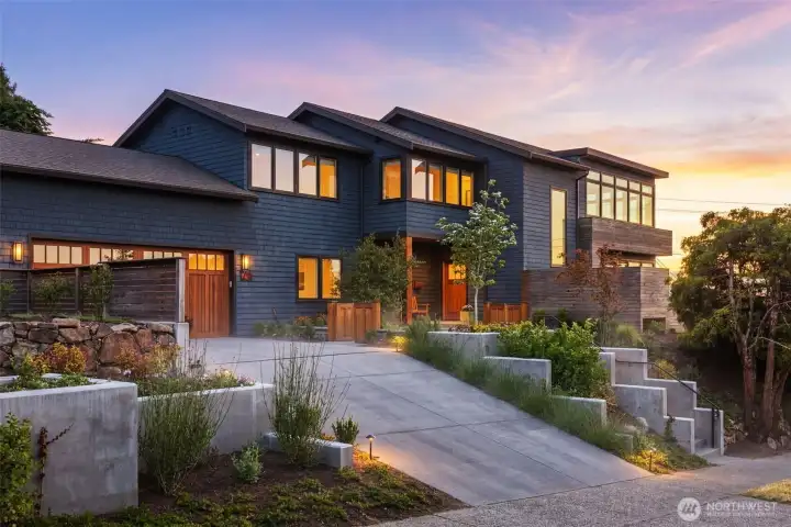 Recently completed landscape refresh with bluestone, native  plantings, and automated lighting and irrigation is just coming into bloom