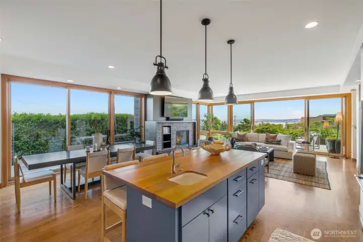 Floor-to-ceiling, south-facing fir windows and  sliding doors