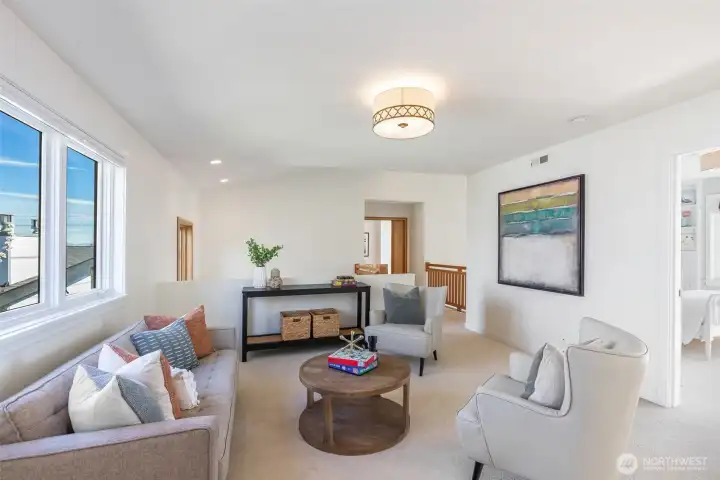 Flex space upstairs could be a play area, office or media space