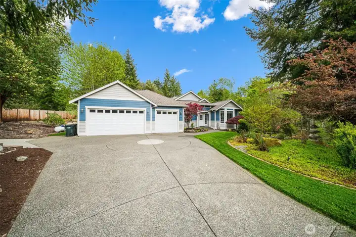 Welcome to this stunning rambler with three car garage.