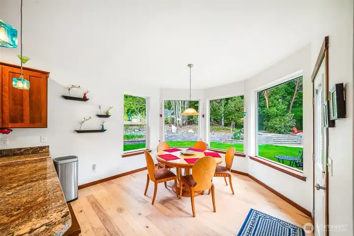 Dining area with lots of windows to enjoy the property views.
