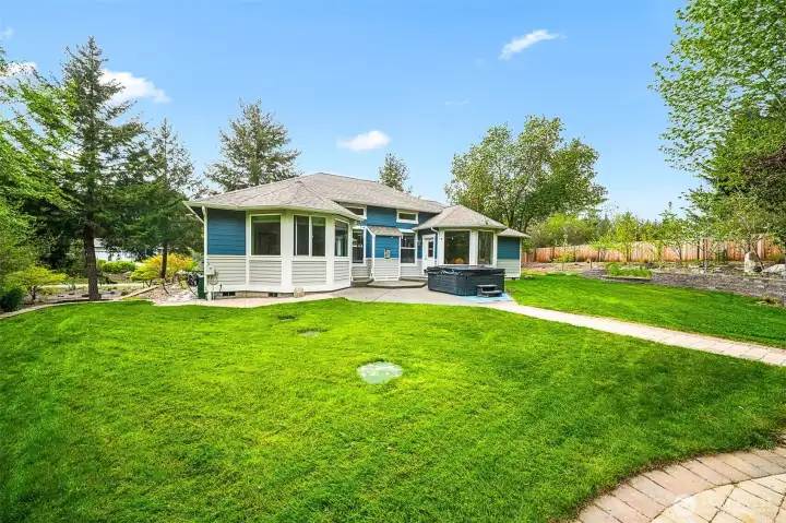 check out the hot tub! To the right there are lots of fruit trees too.