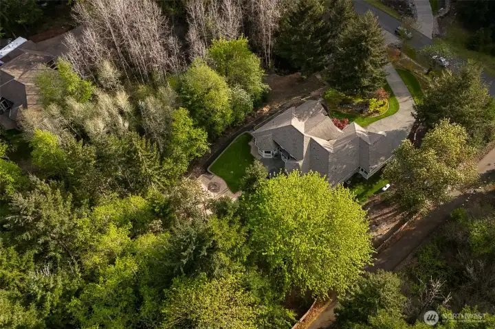 Surrounded by trees to enjoy some privacy and in a gated community.