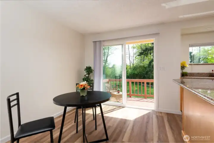 Dinning area with sliding glass doors to access the Deck Area