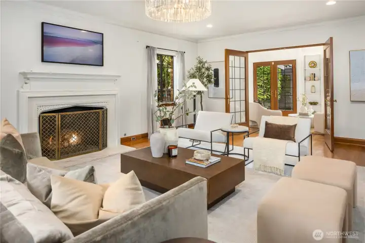 Looking the other way-French doors divie the living room from the sunroom, music room, library... you decide! Looking the other way-French doors divie the living room from the sunroom, music room, library... you decide!