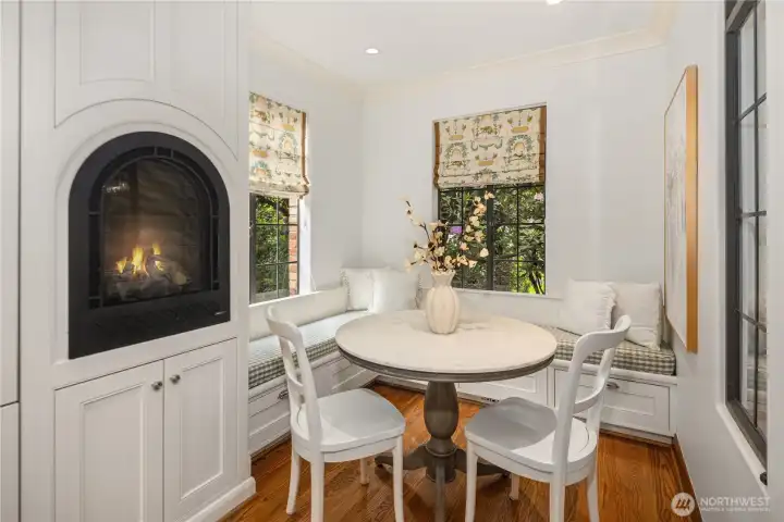 To the side of the kitchen, there is a lovely brreakfast nook and a built-in electric fireplace to give it a cozy feel on cool mornings! To the side of the kitchen, there is a lovely brreakfast nook and a built-in electric fireplace to give it a cozy feel on cool mornings!