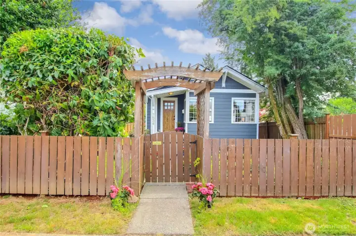 Front gate opens to your fully fenced yard.