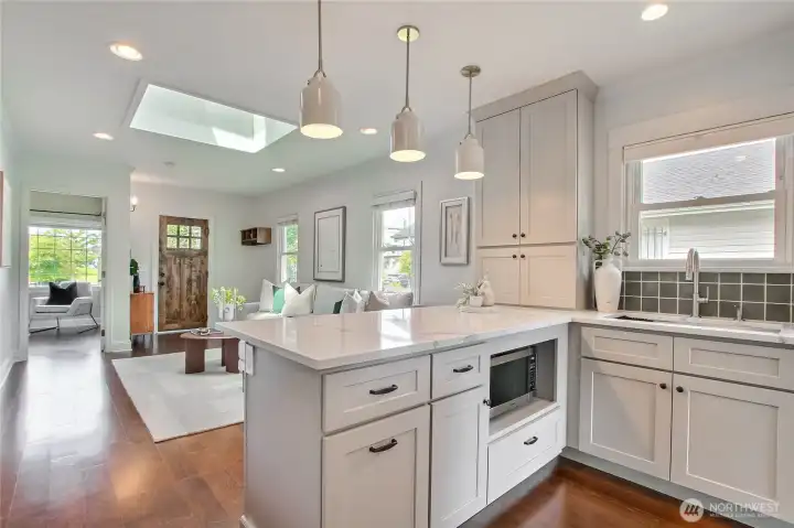 Imagine having your coffee or tea with this eat-in kitchen and Quartz countertops.