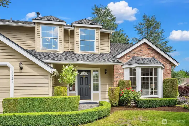 Charming front entry framed by manicured landscaping and classic Pacific Northwest curb appeal, offering a warm and welcoming first impression. Charming front entry framed by manicured landscaping and classic Pacific Northwest curb appeal, offering a warm and welcoming first impression.