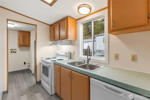 Kitchen with new dishwasher and sink