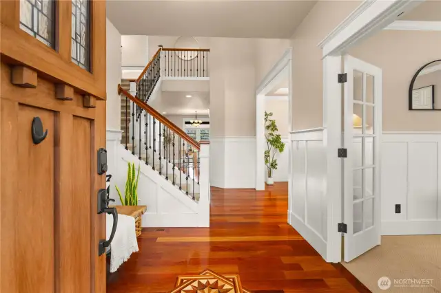 Grand entry way with an office space located to the right.