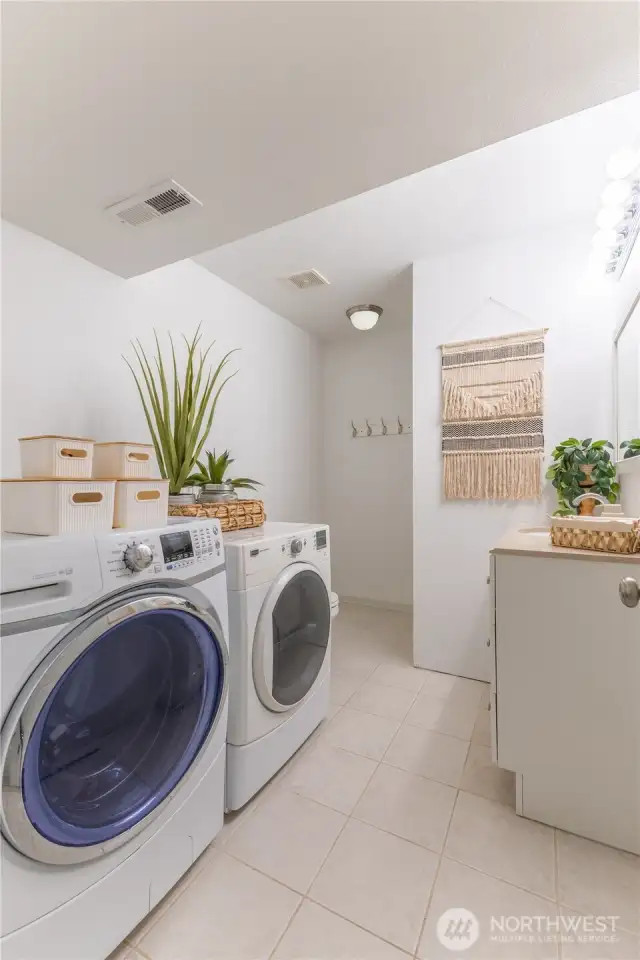 Downstairs Bath, shower, and laundry