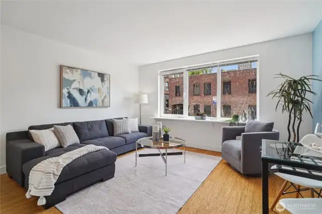 The efficient layout lives larger than its square footage may suggest - plenty of room in here for a full-size couch!