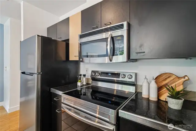 Whip up tasty culinary creations in the kitchen, outfitted with stainless steel appliances.