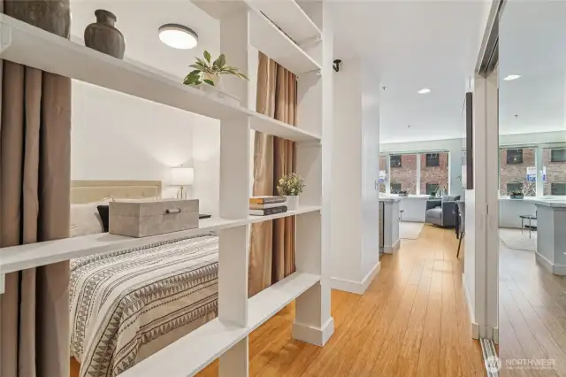 Cute built-in shelving separates the bedroom space from the rest of the unit, giving you perfect privacy and space to show off your favorite treasures.