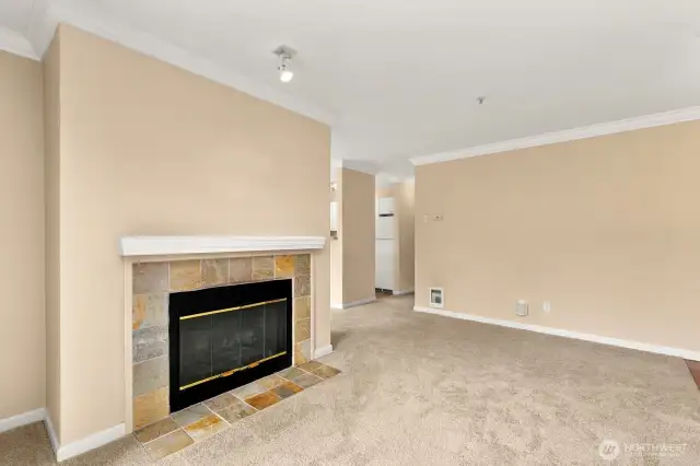 Stylish gas fireplace anchors the living area beautifully!