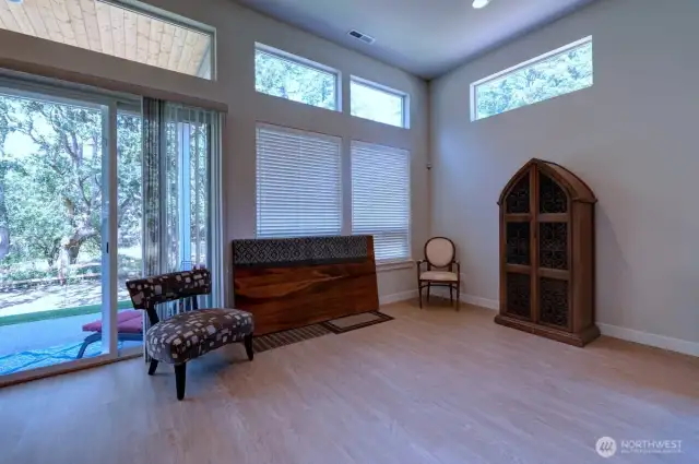 Dining Area With Soaring Ceiling & lots of Windows