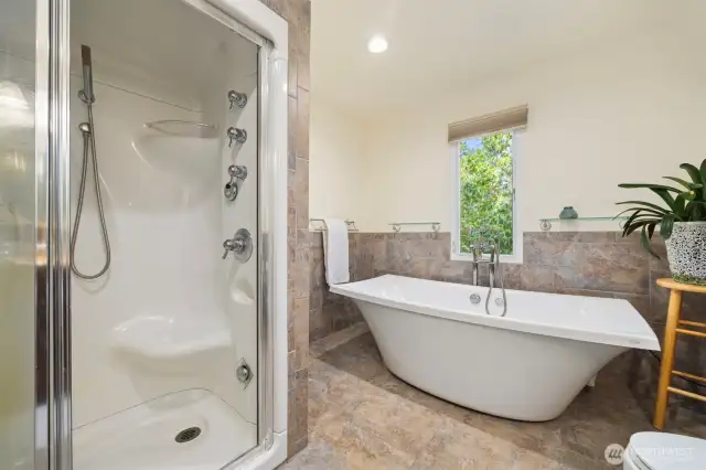 An ensuite primary bathroom with a steam shower!