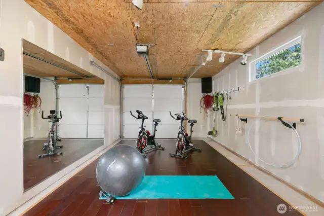 2 Bay Garage. 1 Bay Currently Set Up as a WorkOut Space.