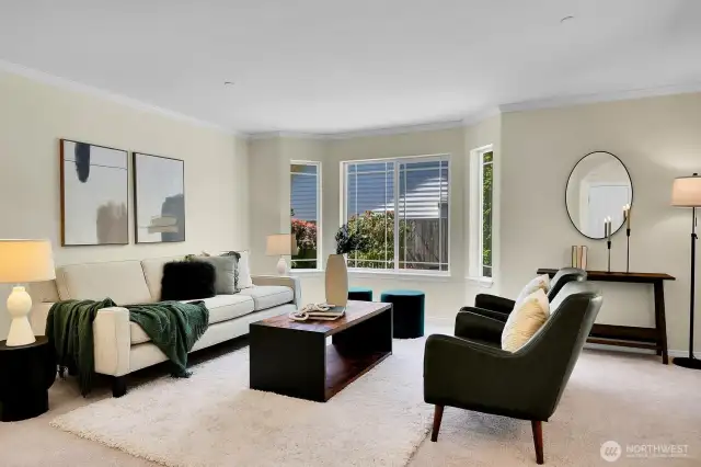 This large formal living room features a bay window. Bring on the entertaining!