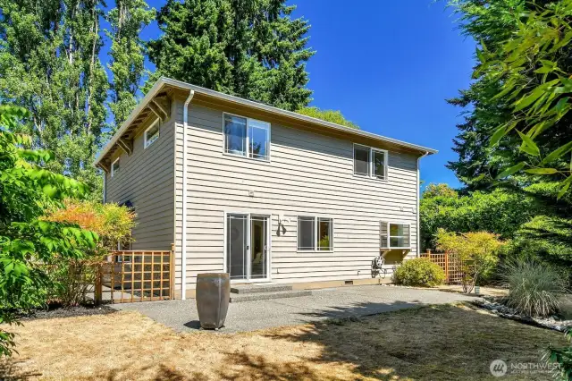 This fully-fenced backyard is serene and private.