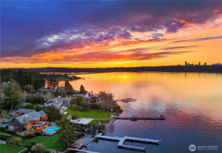Experience the very best of lakefront living- 85 feet of private waterfront, a pristine beach & fire pit at the water's edge. Plus rare, grandfathered-in boat house and exclusive lake water rights for landscape irrigation.