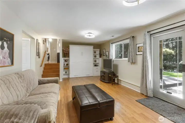 Family Room downstairs includes built-in 'Murphy Bed.'