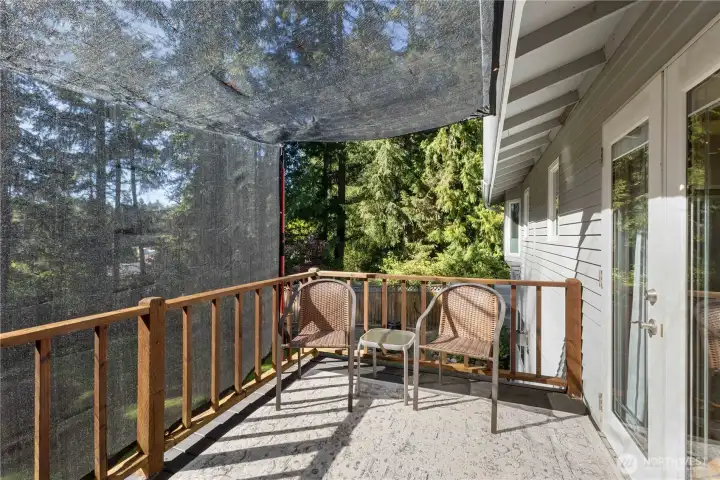 Upped deck sitting area off Primary Bedroom.