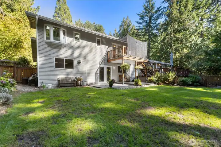 Large rear yard fenced area.
