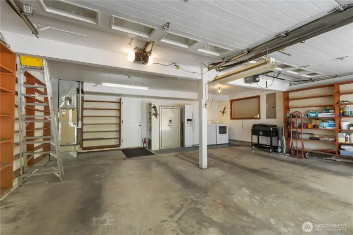 Oversized 2-Car Garage includes second set of washer & dryers.